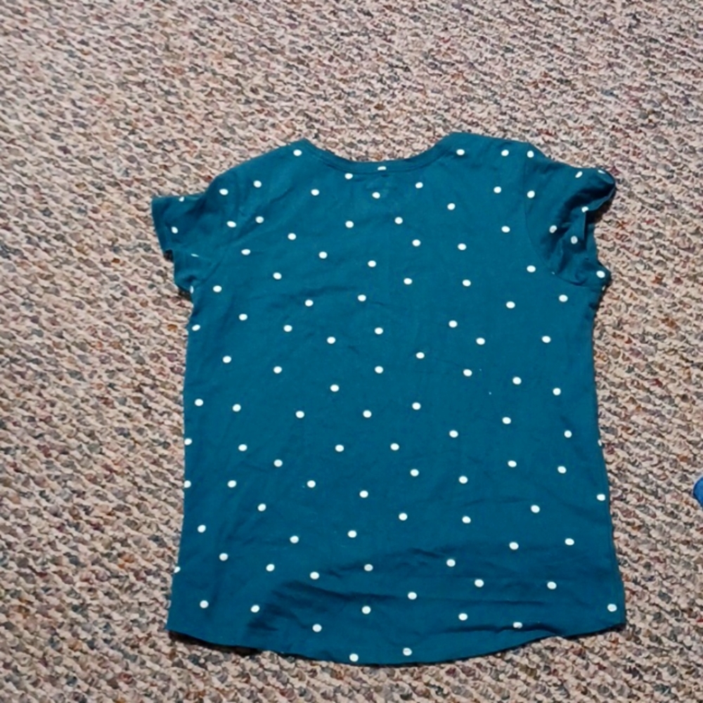 A green Poke-a-dotted shirt